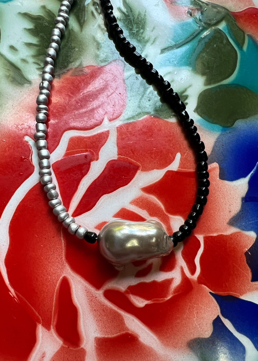 Silver, black and baroque pearl talisman