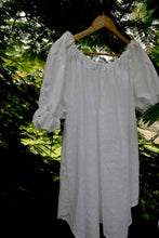 Load image into Gallery viewer, White one size, plus size, heirloom lace smock top with lace details on a wooden hanger against 